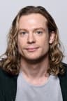 Portrait of Sam Reid.