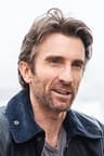 Portrait of Sharlto Copley.
